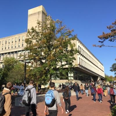 Students walking toward the McLaughlin Library. 